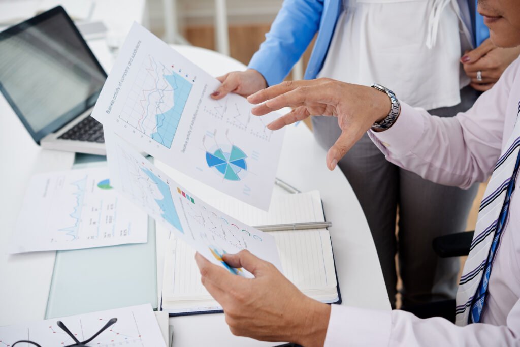 Doctor reviewing practice metrics dashboard on laptop — practice metrics for doctors